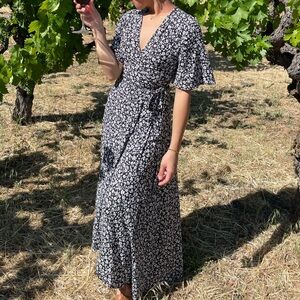 Nobody's Child Wrap Maxi Dress in black and white floral print
